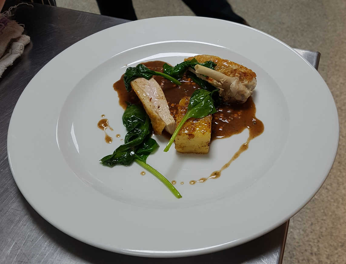 Aaron's Guinea Fowl Supreme with Fondant Potatoes, Wilted Spinach and Red Wine Jus