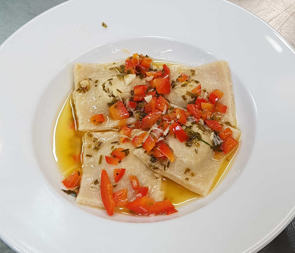 Lee's Crab Ravioli with Red Pepper, Olive Oil and Lime Juice Dressing.