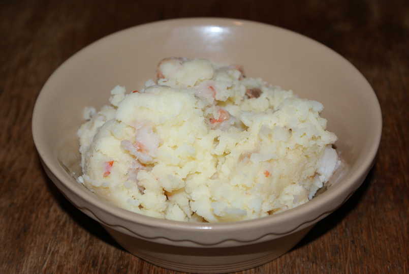 Mash with whisky-poached prawns