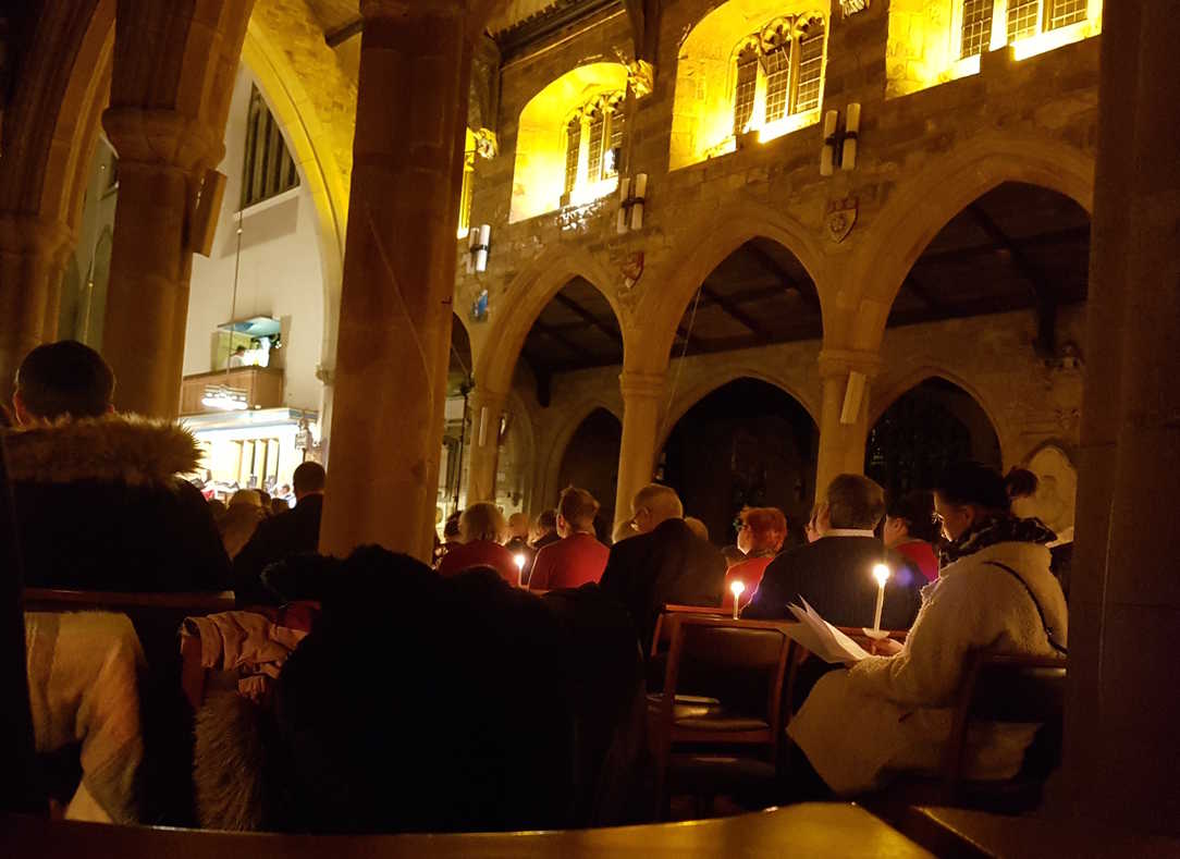A candlelit Christmas carol concert