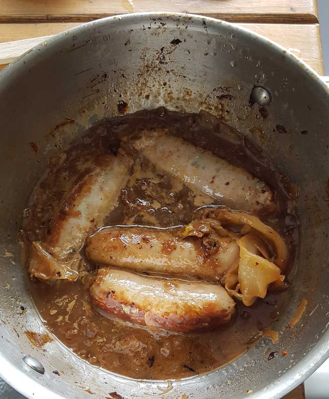 Sausages Braised with Cabbage and Caraway Seeds