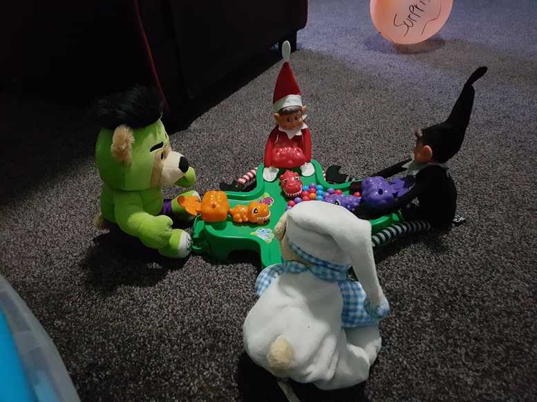 Cheeky Elves Playing 'Hungry Hungry Hippos'