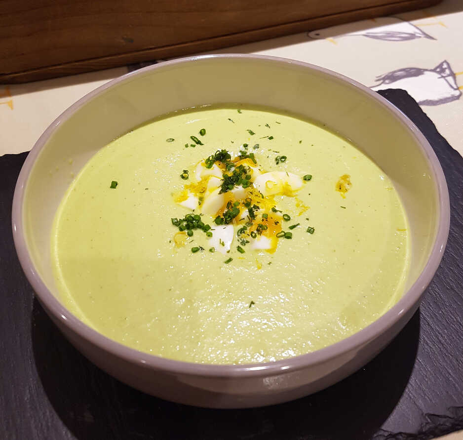 Chilled Cucumber and Lovage Soup, garnished with Hard Boiled Eggs, Lemon Zest and Chives