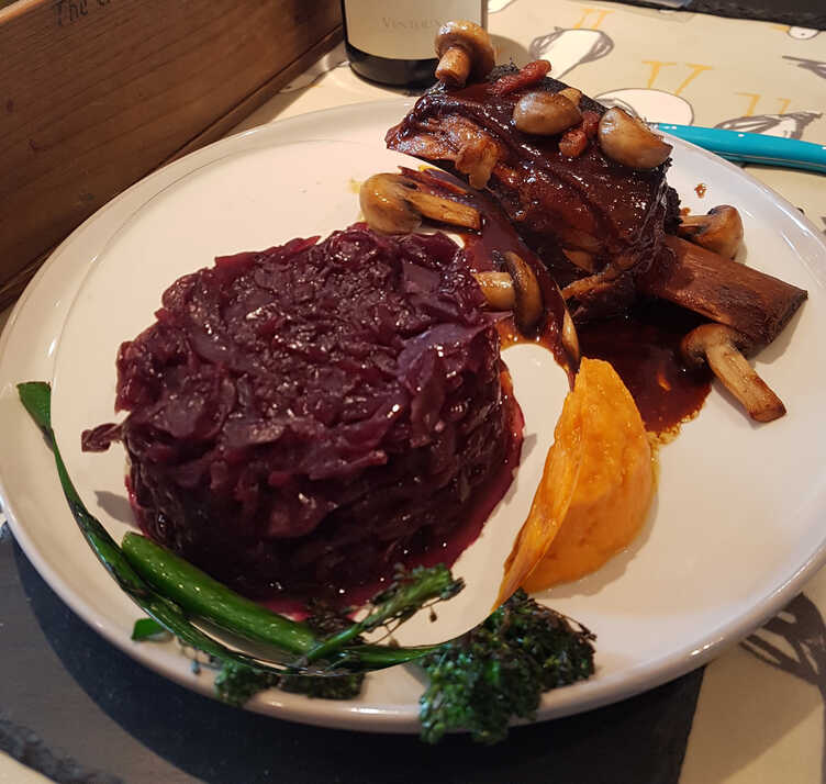 Red Cabbage Braised with Cider and Apple, served here with Slow-Braised Short Ribs.