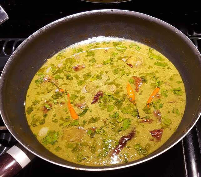 Cooking the Sauce for Thai Green Curry Duck with Lychees.